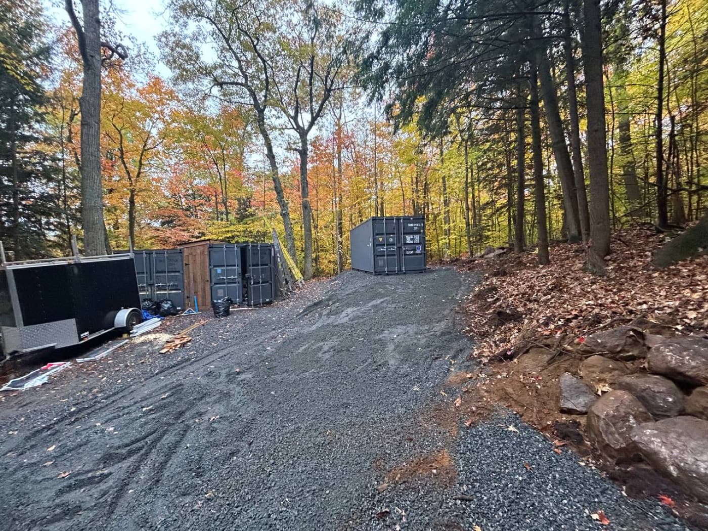 Dropped on a prepared pad at a wooded property